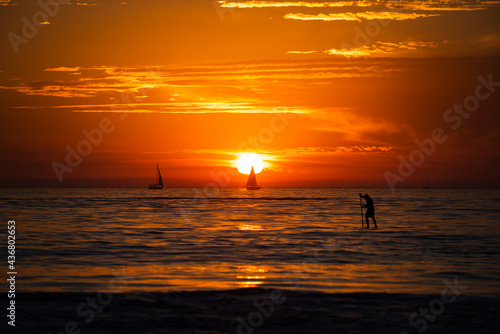 Fototapeta Naklejka Na Ścianę i Meble -  Sunset in the sea with beautiful clouds. Sunrise ocean seascape.