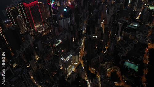 AERIAL. Top view of Hong Kong city at night time. © skymediapro