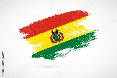 Happy independence day of Bolivia with vintage style brush flag background