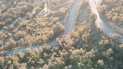 drone flying over mountain road