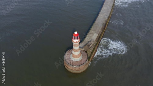 Roker Pier and Lighthouse in Sunderland at the Mouth of the Harbour photo