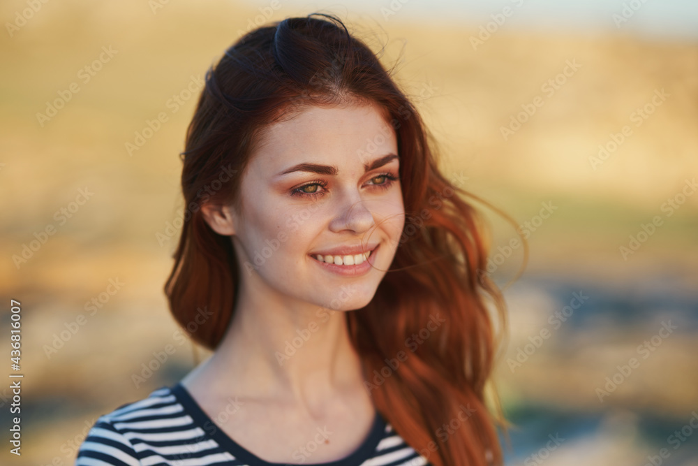 happy woman in the mountains outdoors smile laughter makeup model