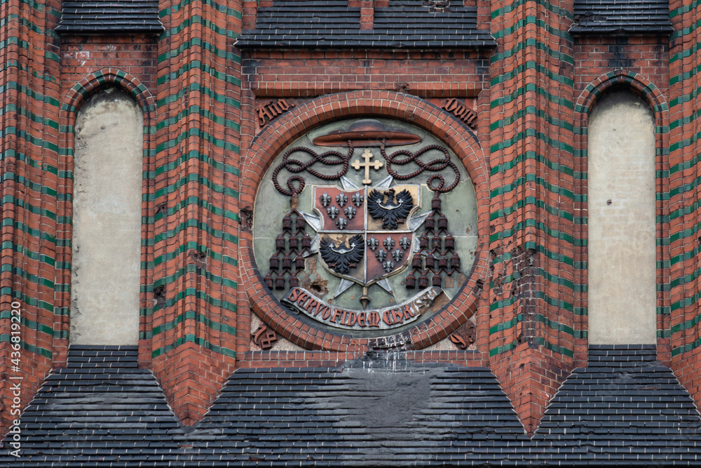 Vintage cardinal's coat of arms with an inscription in Latin "Servo