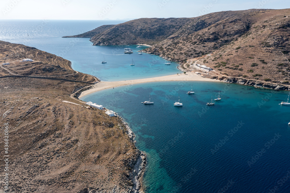 Kolona Fykiada double sided sandy beach, aerial drone view. Greece, Kithnos island, Cyclades.