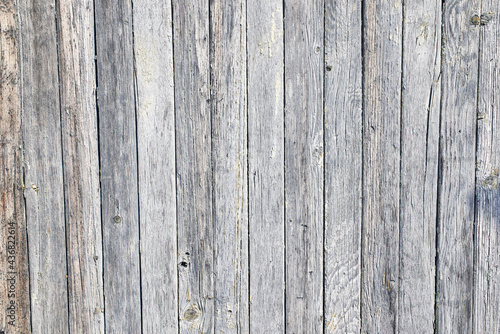 Old wooden fence. Aged texture, material. Beautiful background.