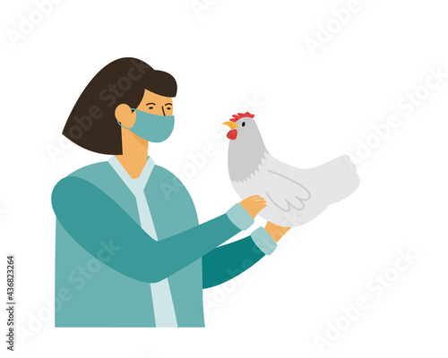 Doctor in medical mask hold chicken in his hands