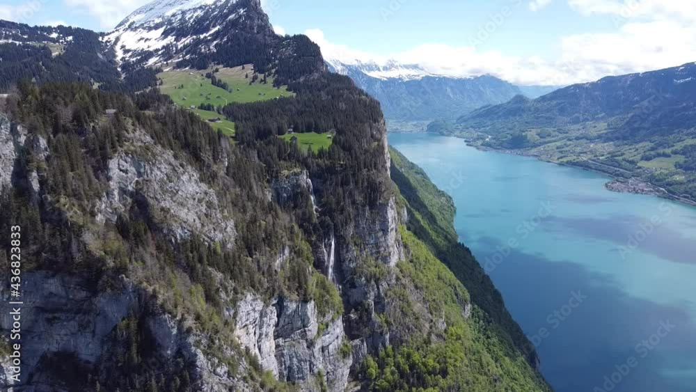 Drone video of lake and mountain cliff Drone video of lake and mountain cliff