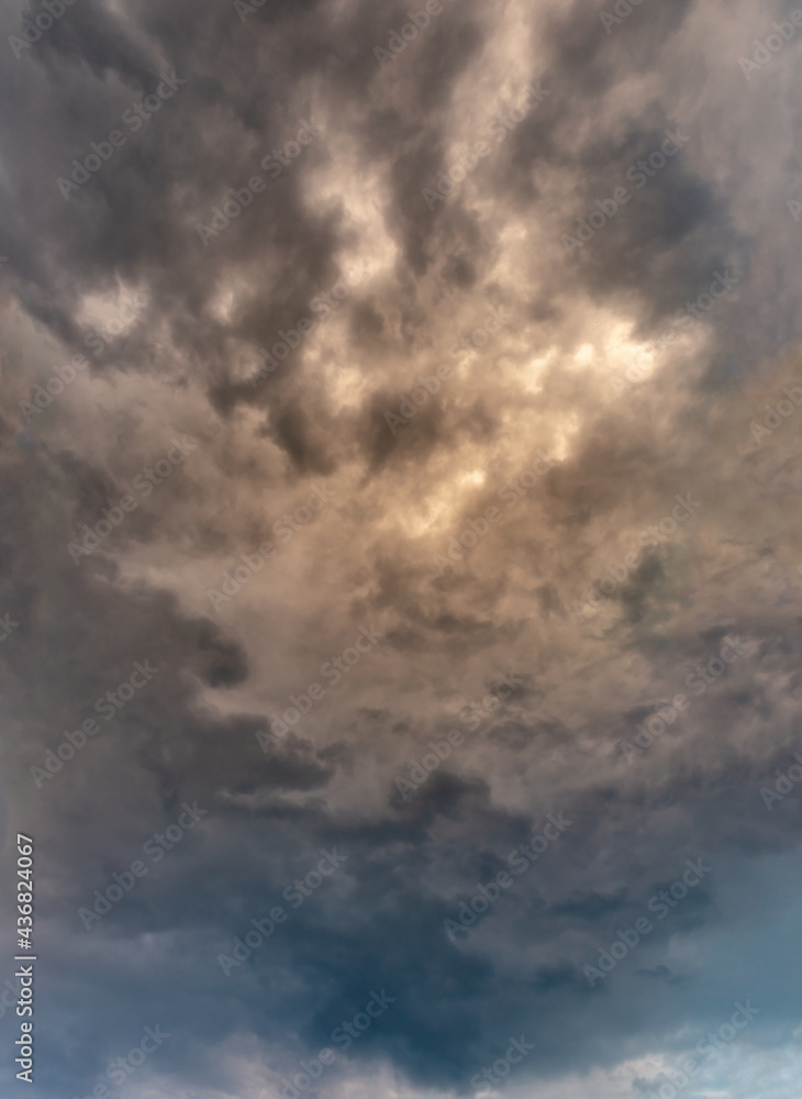 Fantastic clouds at sunrise, vertical panorama Fantastic clouds at sunrise, vertical panorama