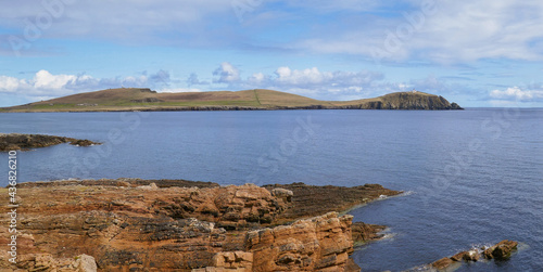 A view of Sumburgh Head at the south of the Shetland, UK, taken from the Ness of Burgi on a calm, sunny day in Spring. photo