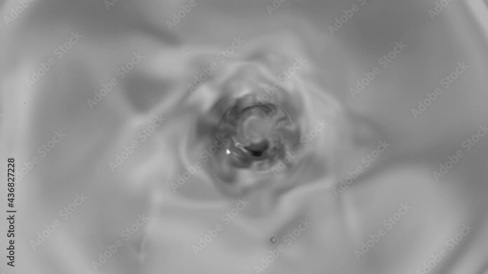 Super slow motion of dripping water drop filmed with macro lens. Filmed on high speed cinema camera, 1000 fps. Super slow motion of dripping water drop filmed with macro lens. Filmed on high speed cinema camera, 1000 fps.