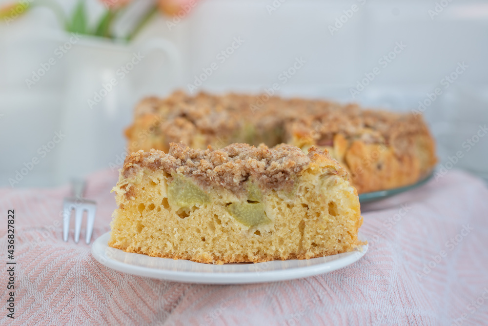 Home made Sweet Rhubarb cake with fresh rhubarb and cinnamon streusel Home made Sweet Rhubarb cake with fresh rhubarb and cinnamon streusel