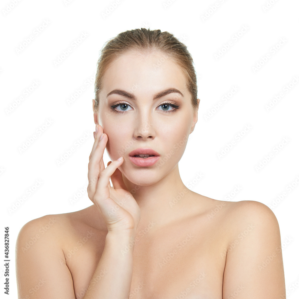 Young attractive woman with perfect make-up posing at studio over white background, beauty female portrait. Young attractive woman with perfect make-up posing at studio over white background, beauty female portrait.