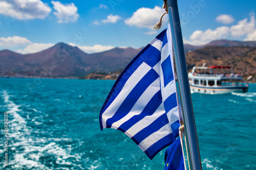 Obraz na płótnie Greek waving flag on a ship off the Greek coast w salonie