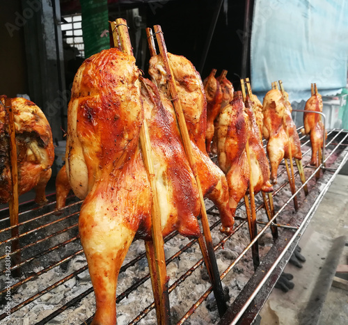 Kai Yang Wichian Buri Or Chicken Grilled in a traditional style, Very Popular Foods in Thailand photo