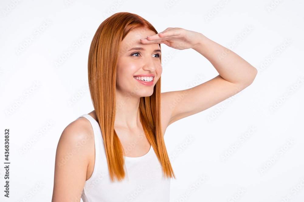 Profile side photo of young girl happy positive smile look watch ahead isolated over grey color background Profile side photo of young girl happy positive smile look watch ahead isolated over grey color background