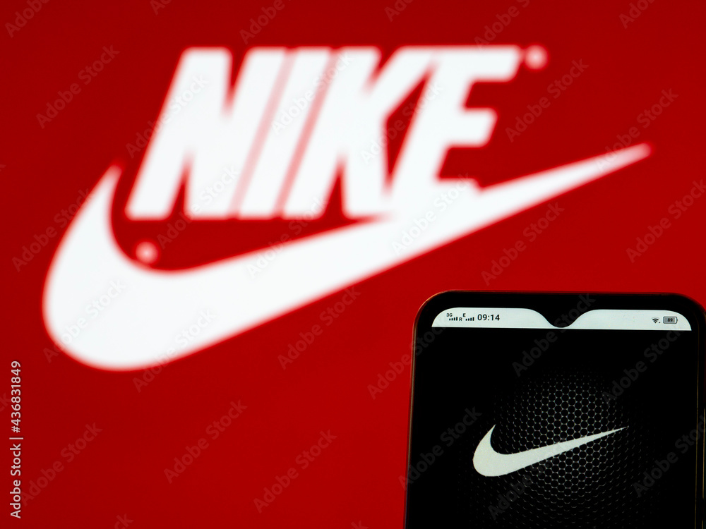 bloquear Silenciosamente Escudriñar In this photo illustration Nike, Inc. logo seen displayed on a smartphone  Stock Photo | Adobe Stock
