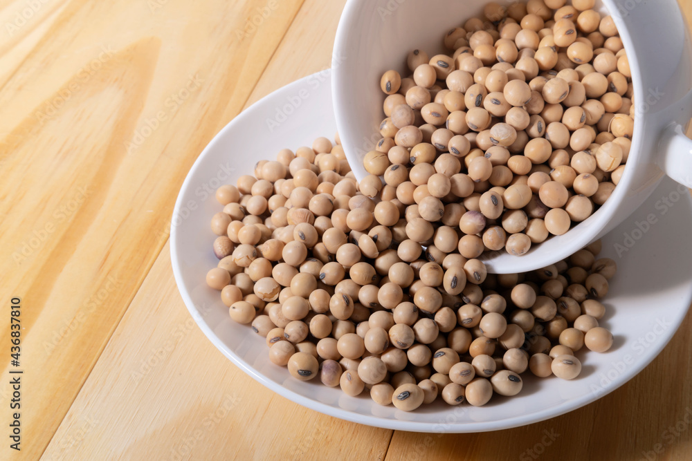Organic soy beans on wooden table, flat lay. Organic soy beans on wooden table, flat lay.