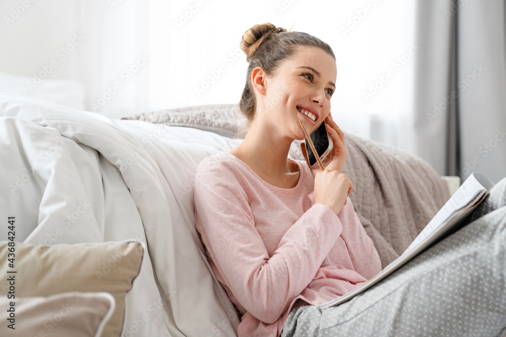 Smiling young white woman in lounge wear Smiling young white woman in lounge wear