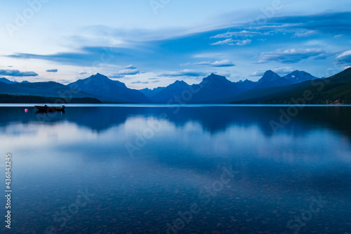 tranquil Lake Mc Donald in a clear summers day in Glacier National park in Montana. © Nathaniel Gonzales