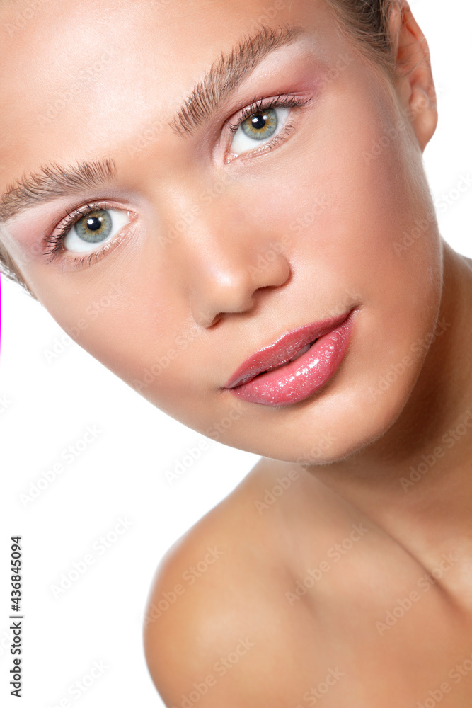 Obraz premium Portrait of a beautiful young woman with clean skin and soft day makeup, beauty treatment, cosmetology and anti-aging theme
