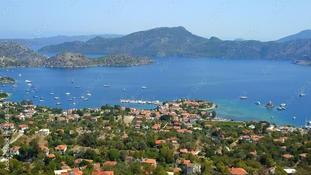 Mediterranean resort town Bozburun next to Marmaris Bay. Aerial, drone landscape of the beautiful bay with a wonderful turquoise sea, Turkey Country
Mediterranean resort town Bozburun next to Marmaris Bay. Aerial, drone landscape of the beautiful bay with a wonderful turquoise sea, Turkey Country