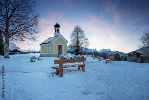 dreamy sunset scenery, Maria Rast chapel in winter photo