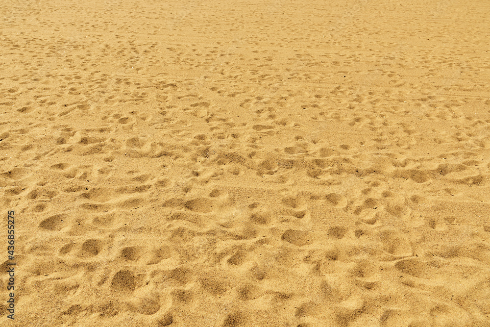 Dark yellow sand background, sunny seashore. Dark yellow sand background, sunny seashore.