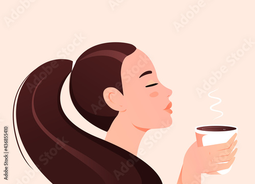 Beautiful girl holding a cup of morning flavored coffee