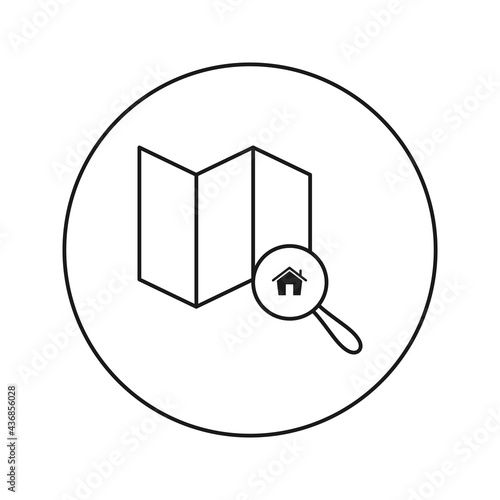House on the map under a magnifying glass.