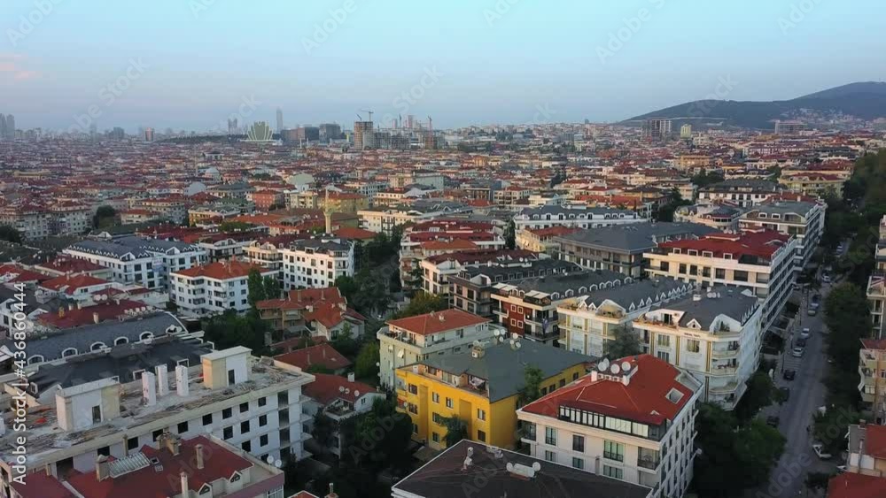 Over dense residential area with many buildings. Millions in Turkey under coronavirus lockdown as major cities restrict daily life. Coronavirus virus empties city streets. Urbanization landscape Over dense residential area with many buildings. Millions in Turkey under coronavirus lockdown as major cities restrict daily life. Coronavirus virus empties city streets. Urbanization landscape