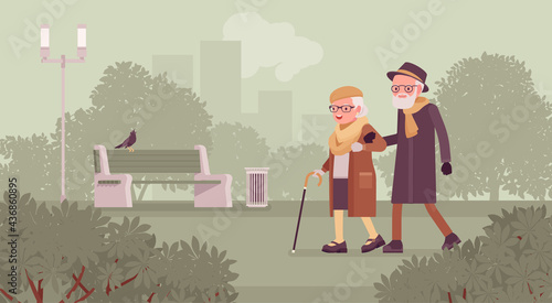 Active seniors, happy healthy elderly people walking through the autumn park. Couple of older adults enjoying together outdoor park promenade arm in arm. Beautiful fall nature scenery background