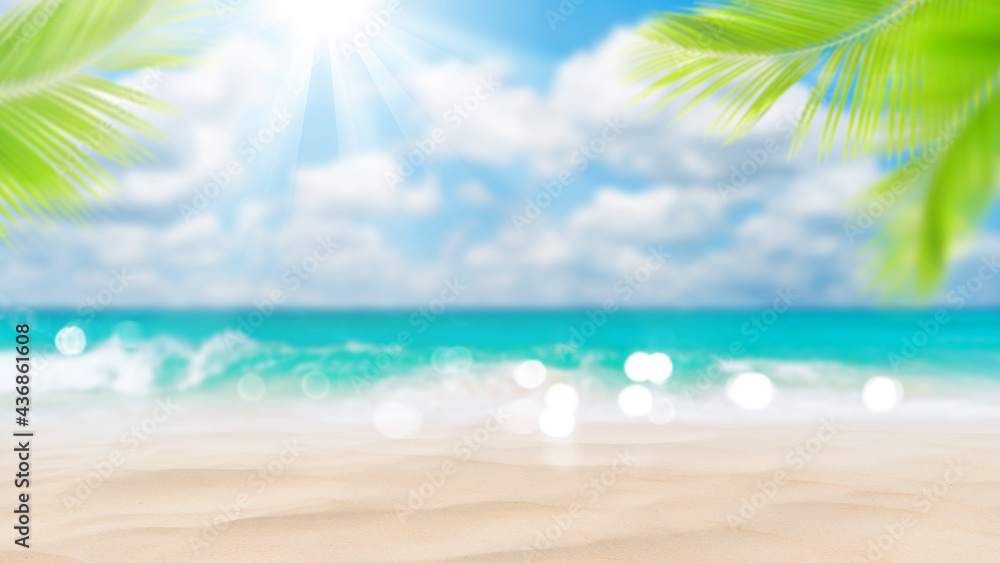 Obraz premium Blur beautiful nature green palm leaf on tropical beach with bokeh sun light wave abstract background.