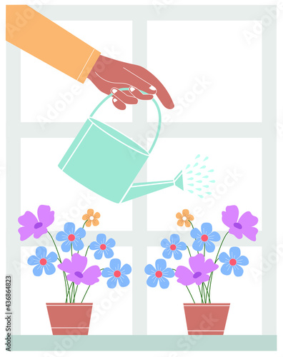 vector image of a hand with a watering can watering flowers