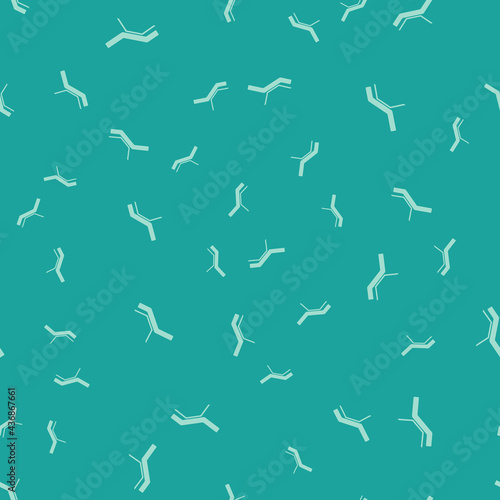 Green Sunbed icon isolated seamless pattern on green background. Sun lounger. Vector