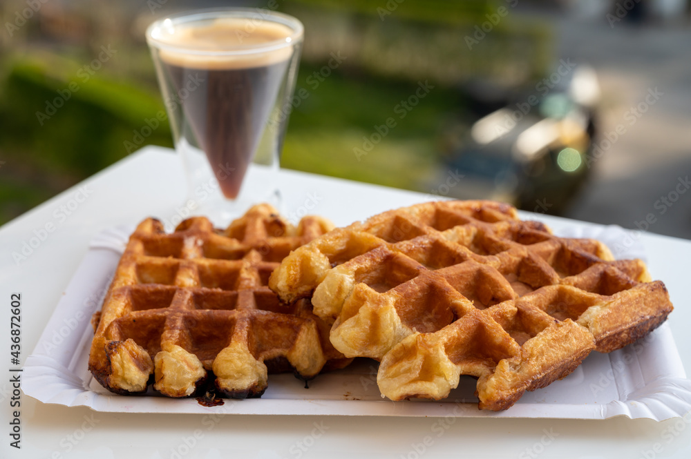 Belgian sugar waffles with black coffee served outdoor Belgian sugar waffles with black coffee served outdoor