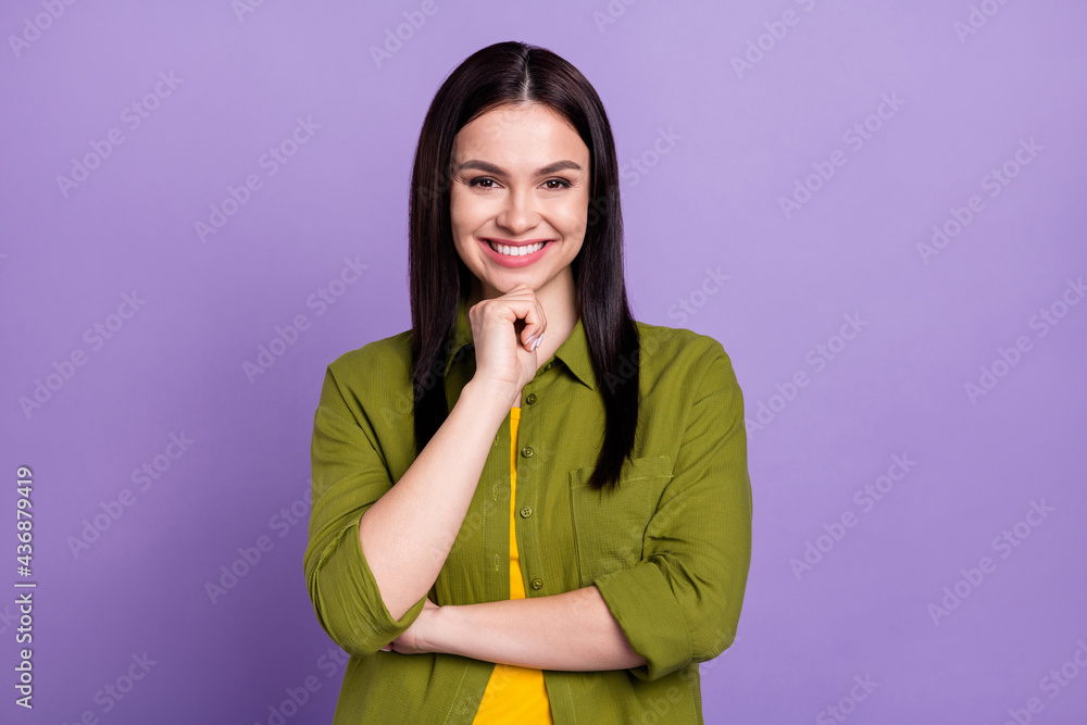 Photo of shiny dreamy young woman wear khaki outfit smiling arm chin isolated violet color background Photo of shiny dreamy young woman wear khaki outfit smiling arm chin isolated violet color background