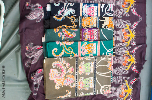 Batik is the art of painting cloth using wax and natural or artificial coloring. Close up colorful and beautiful batik fabric. Javanese batik. Indonesian batik.