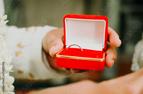 wed couple's hands with wedding rings asia