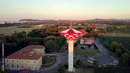 Wallpaper Mural The red tall tower in the middle of the Rimini beach resort as seen in the aerial shot Torontodigital.ca