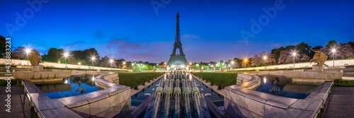 Photography Paris skyline panorama at night with view of Eiffel Tower