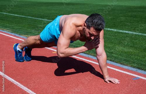man in plank. healthy lifestyle routine. sport success. male athlete do morning exercise. © be free