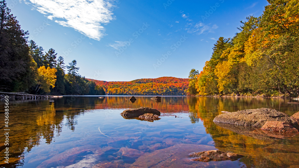 Fototapeta premium Fall colours at Meech Lake in Gatineau Park, Quebec, Canada