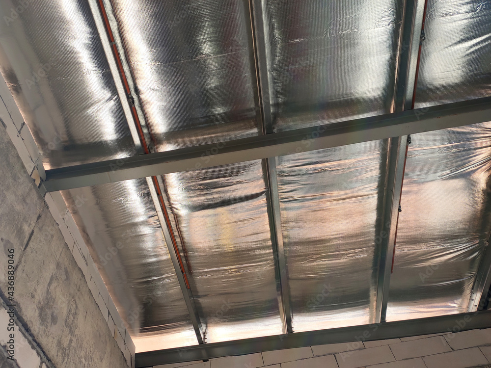 Aluminum foil sheets are used as thermal insulation of the roof. Placed