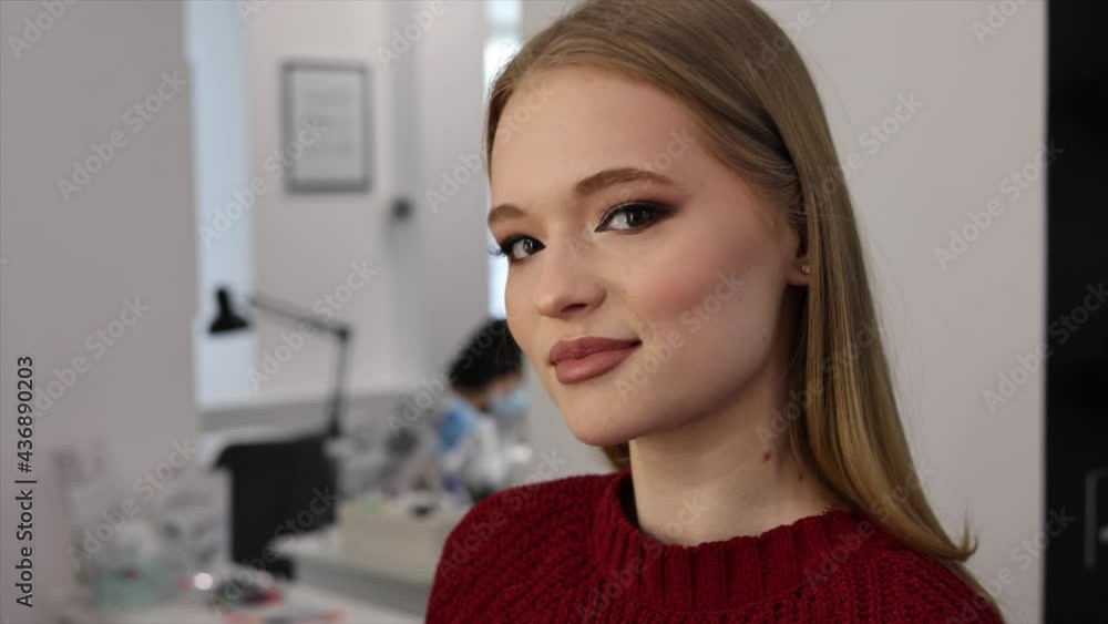 process of face makeup brush alignment of the face tone on a beautiful young woman model blonde process of face makeup brush alignment of the face tone on a beautiful young woman model blonde
