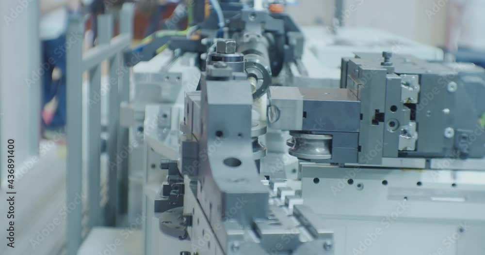 modern working metalworking machine. fragment of working industrial equipment close-up. technological background. modern working metalworking machine. fragment of working industrial equipment close-up. technological background.