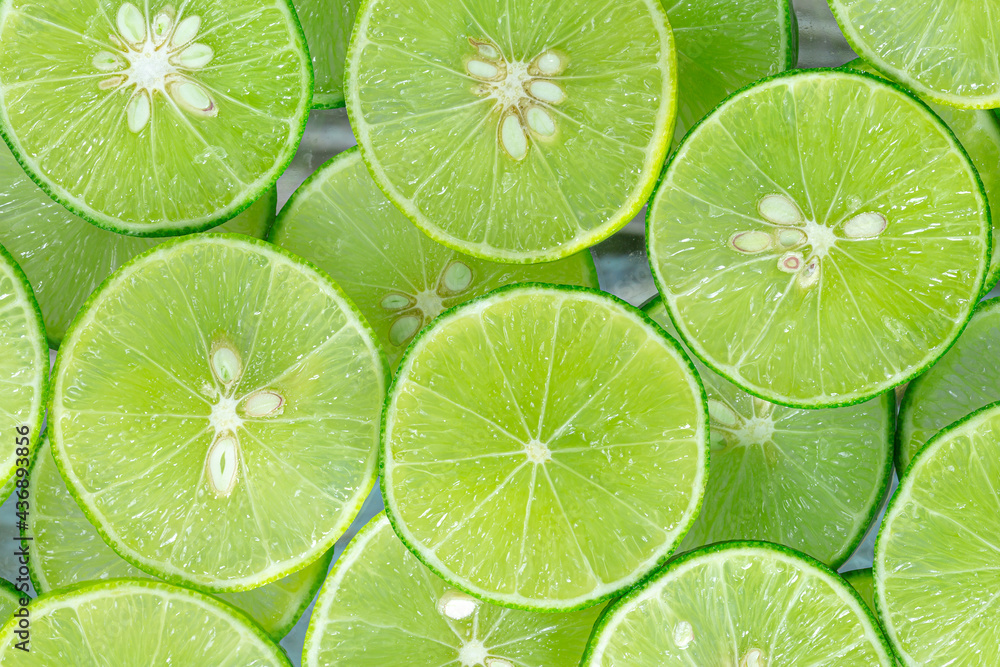 Macro Lime,Fresh lime slices as a background.
