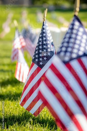 Military Headstones and Gravestones Decorated With Flags for Memorial Day