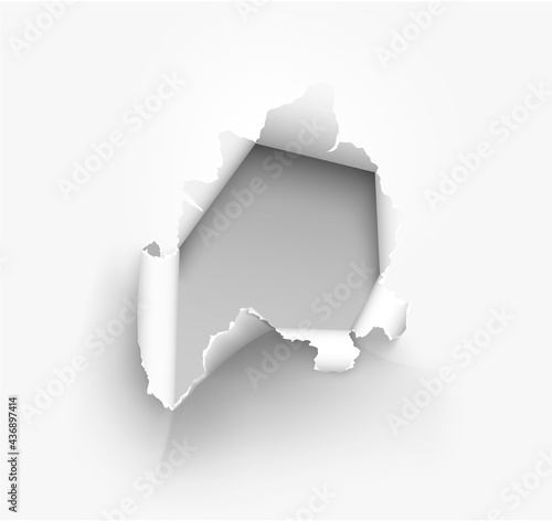 ragged Hole torn in ripped paper on background