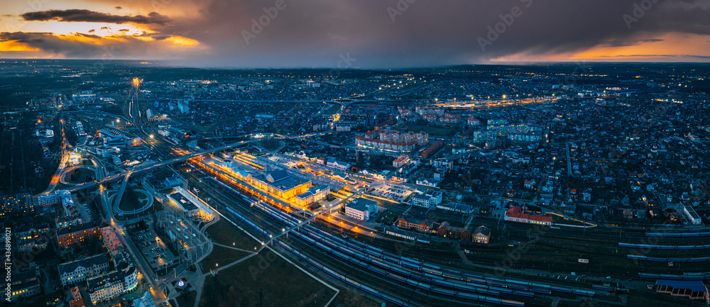 Brest, Belarus. Aerial Bird's-eye View Of Cityscape Skyline. Night Aerial View Of Railway Station. Panorama, Panoramic View - obrazy, fototapety, plakaty 