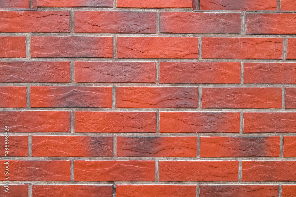 The wall is decorated with artificial stone as a background. The wall is decorated with artificial stone as a background.